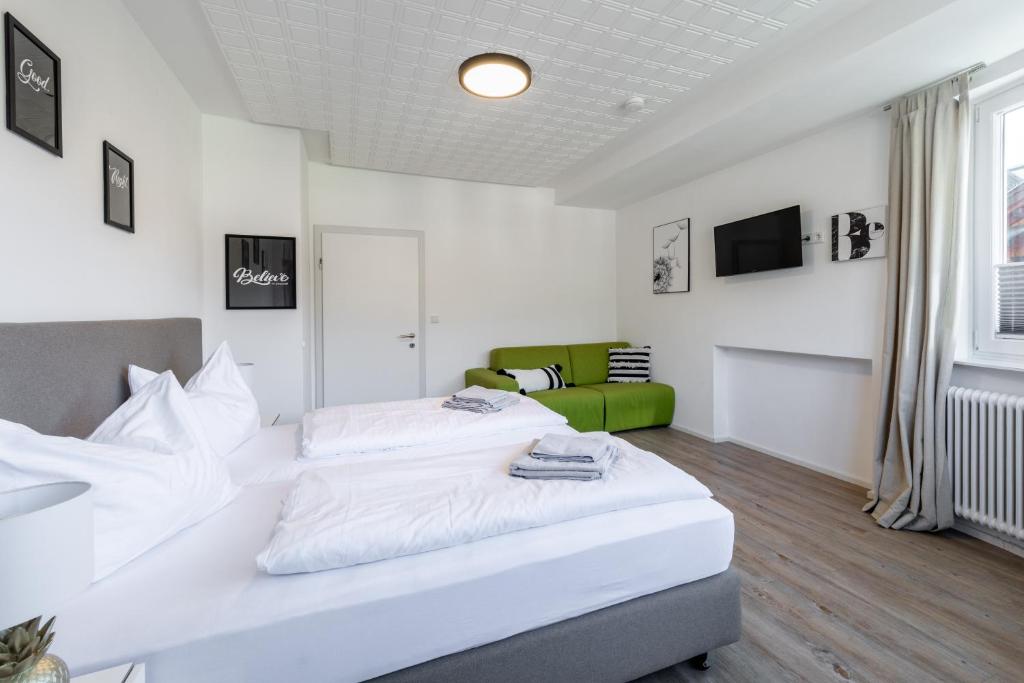 Postel nebo postele na pokoji v ubytování Appartements DAS RETTENBACHER