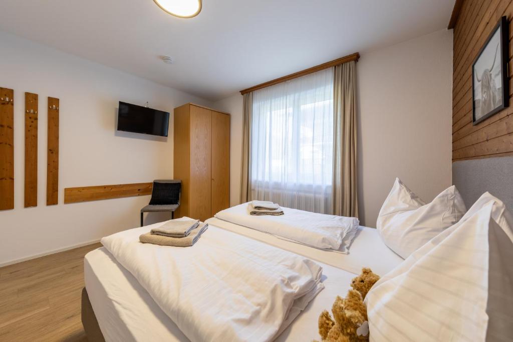 Postel nebo postele na pokoji v ubytování Appartements DAS RETTENBACHER