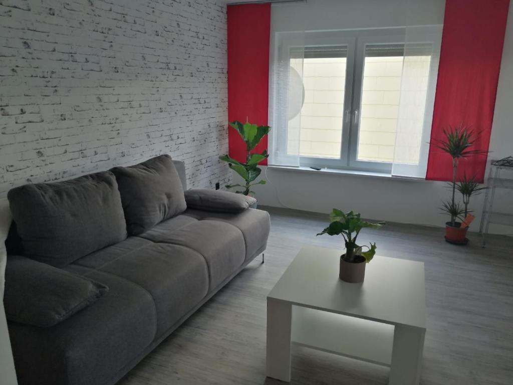 a living room with a couch and a table at Haus Hochwald in Rottweil