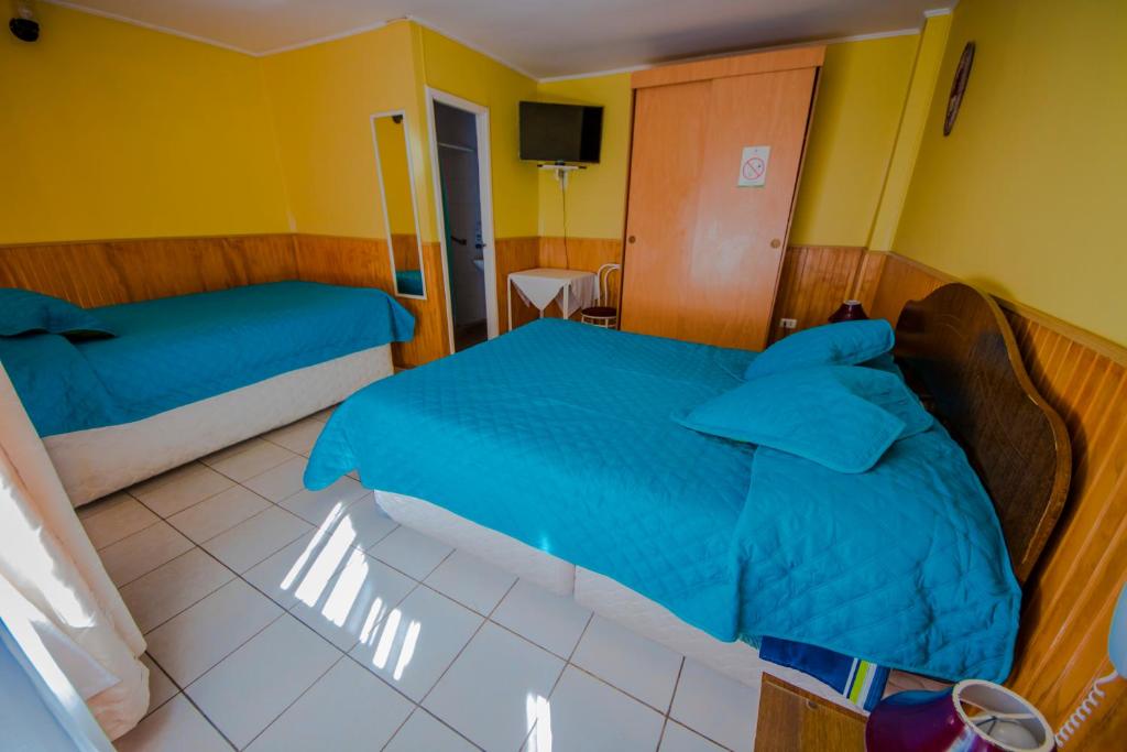Postel nebo postele na pokoji v ubytování Hotel Montecarlo