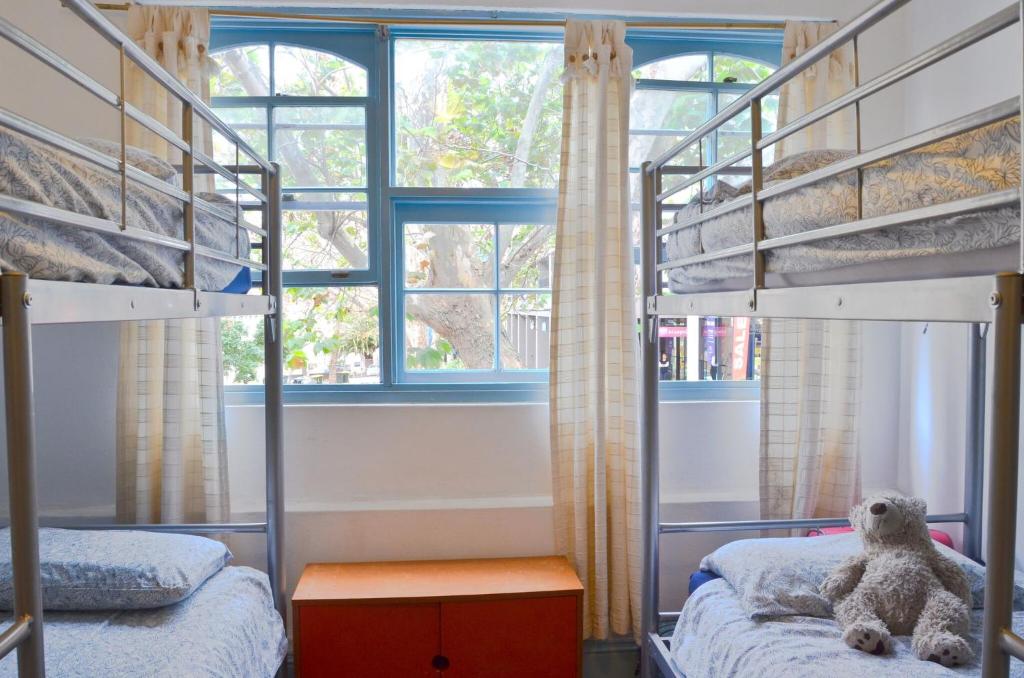 Postel nebo postele na pokoji v ubytování PodBed Sydney