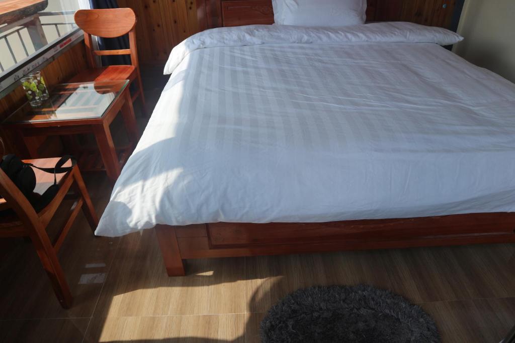 Postel nebo postele na pokoji v ubytování May Nui Sa Pa Hostel