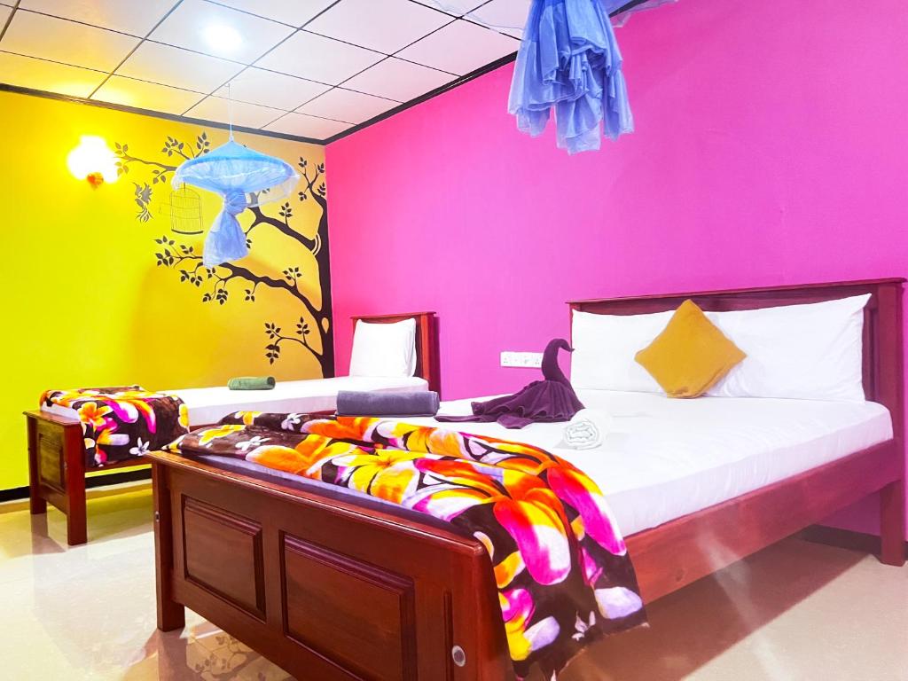 Postel nebo postele na pokoji v ubytování Nine Arch Homestay