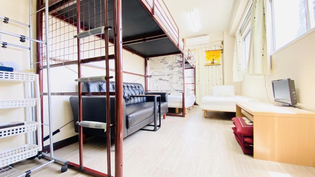 Postel nebo postele na pokoji v ubytování GUEST HOUSE B's FiveⅡ