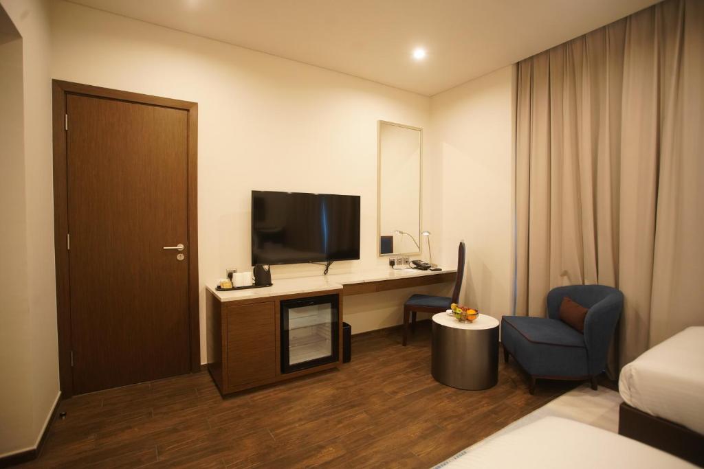 TV a/nebo společenská místnost v ubytování C - Hotel and Suites Doha