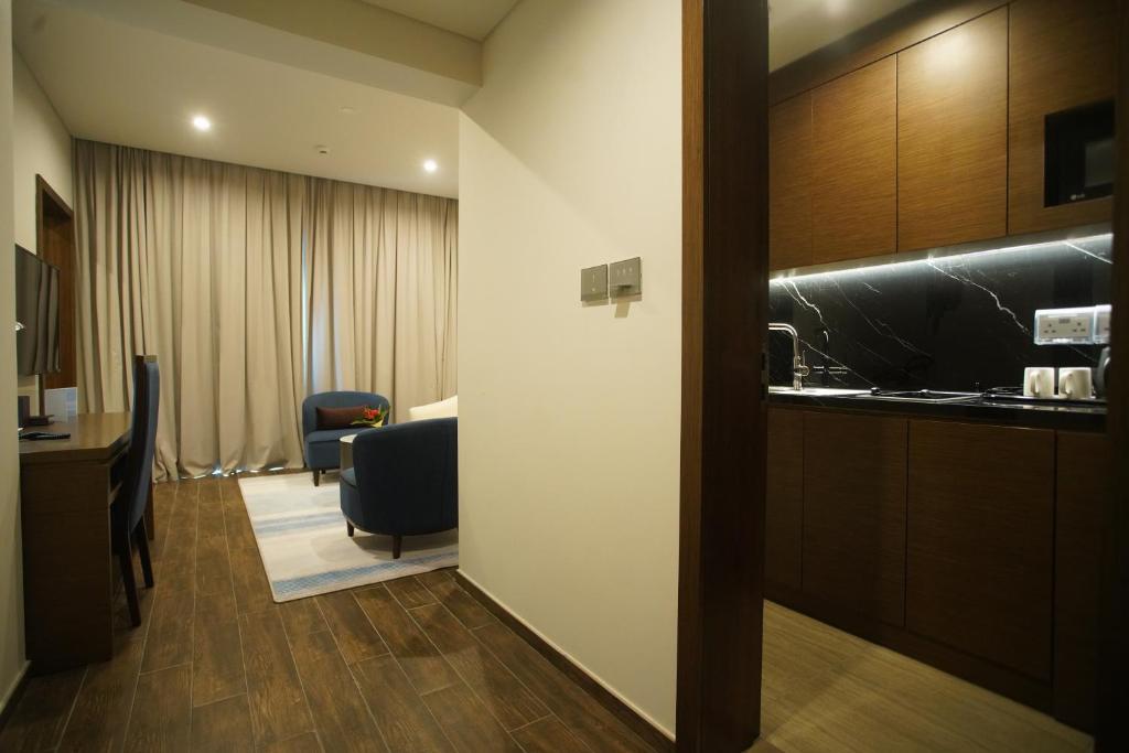 TV a/nebo společenská místnost v ubytování C - Hotel and Suites Doha