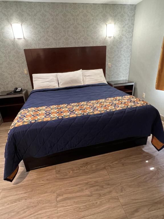 Postel nebo postele na pokoji v ubytování Atlantic Motor Inn