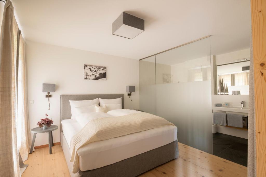 Postel nebo postele na pokoji v ubytování Hallerwirt Homes