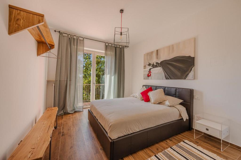 Кровать или кровати в номере Casa Rafanelli