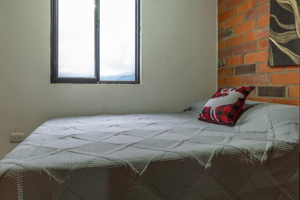 Postel nebo postele na pokoji v ubytování APARTAMENTO MI REFUGIO
