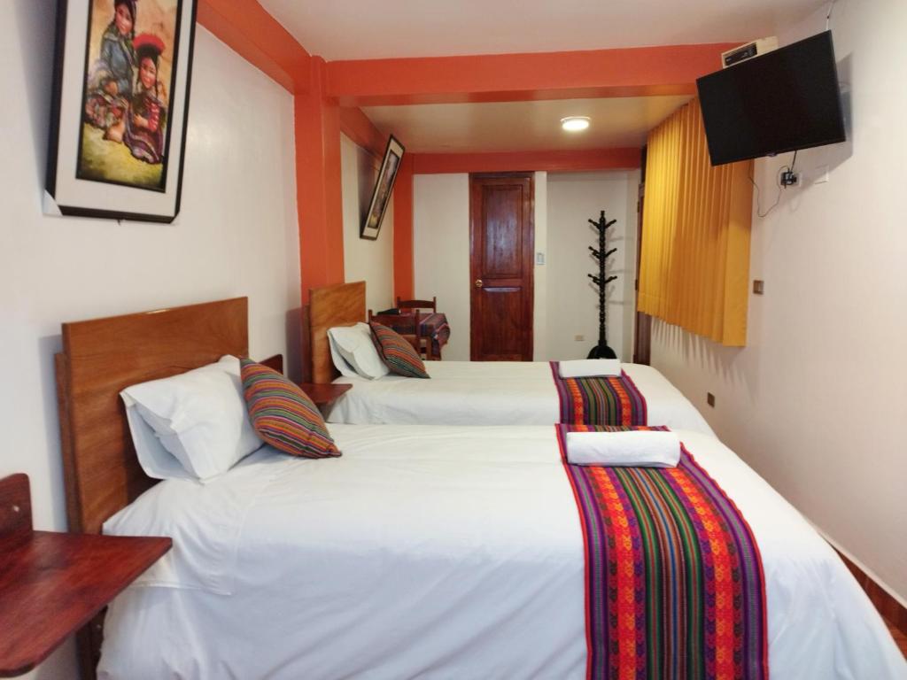 Postel nebo postele na pokoji v ubytování Amakonkay Machupicchu