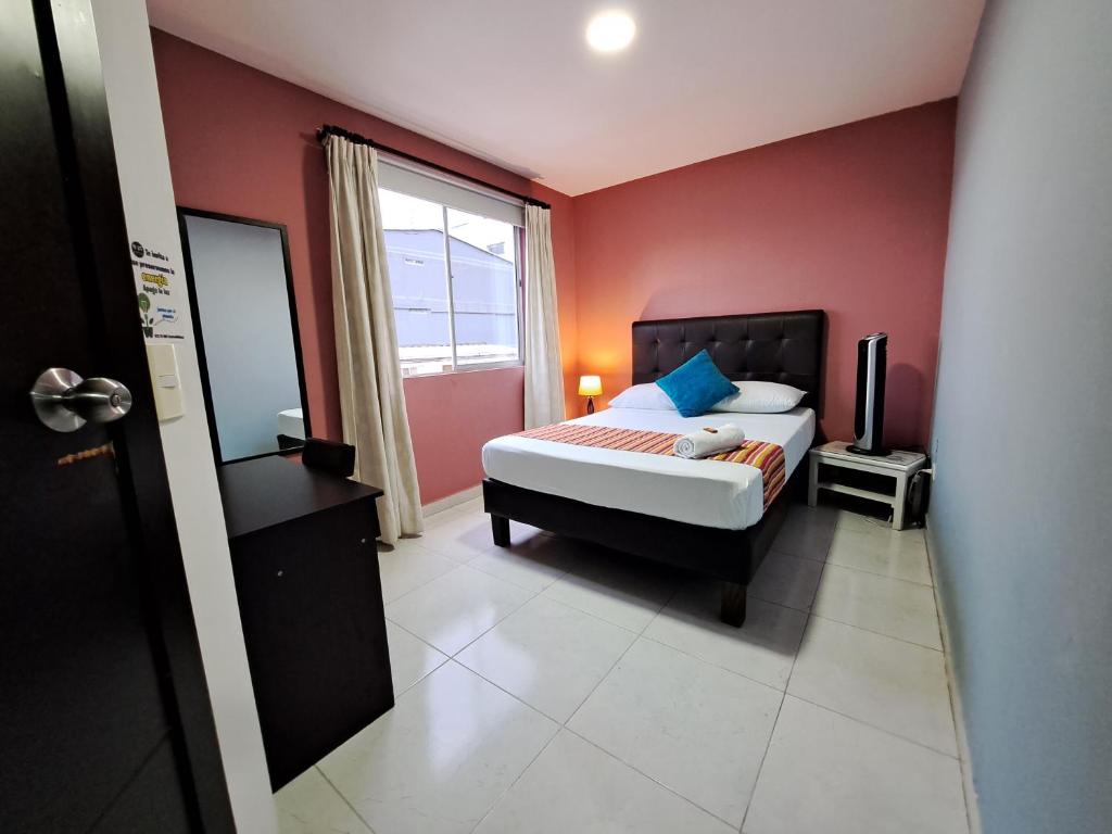 Postel nebo postele na pokoji v ubytování Hotel 9-25