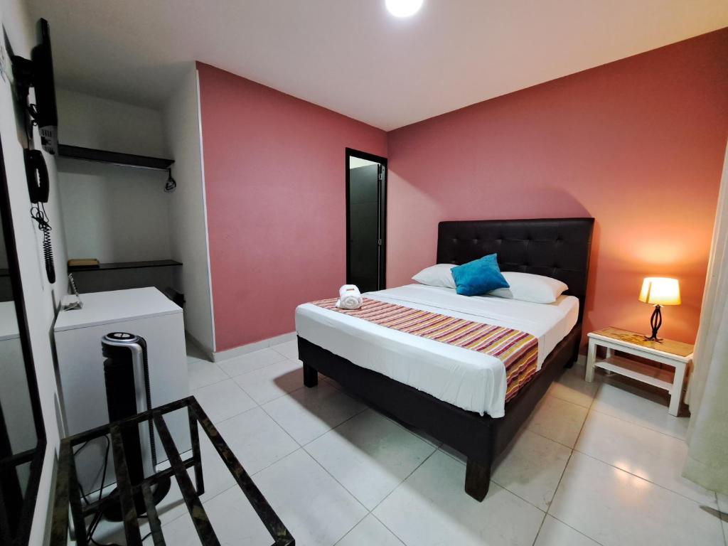 Postel nebo postele na pokoji v ubytování Hotel 9-25
