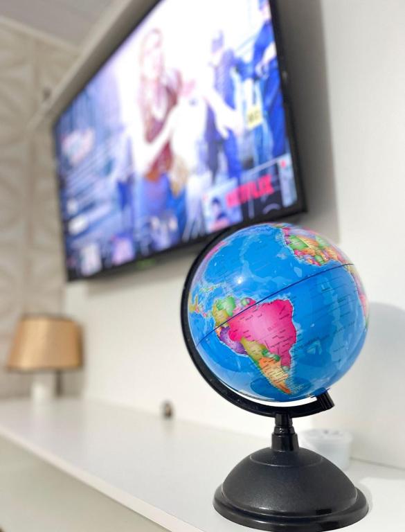 TV a/nebo společenská místnost v ubytování Residencial Napolitan