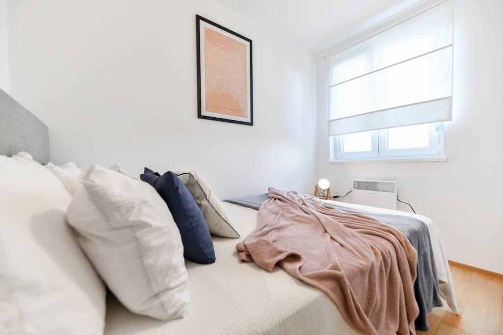 Posteľ alebo postele v izbe v ubytovaní Lea Boutique Apartment