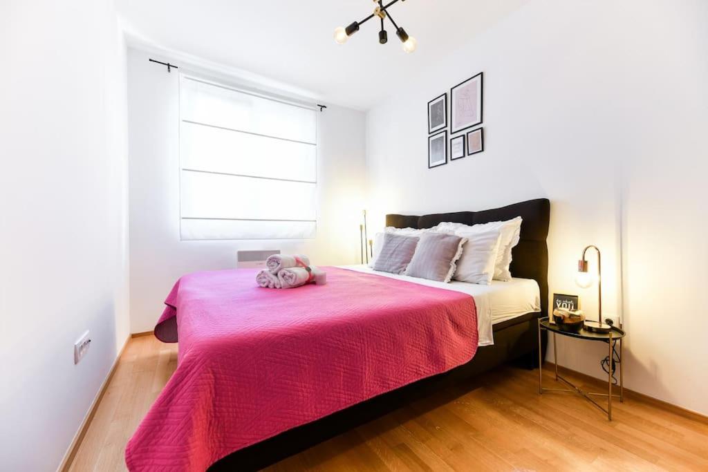 Posteľ alebo postele v izbe v ubytovaní Lea Boutique Apartment