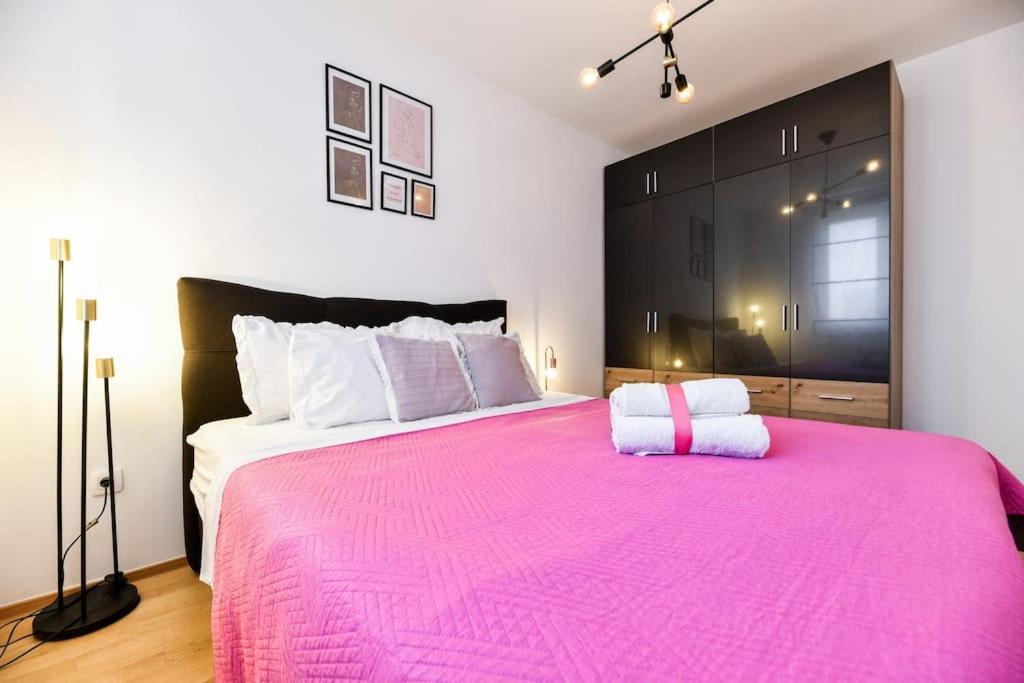 Posteľ alebo postele v izbe v ubytovaní Lea Boutique Apartment