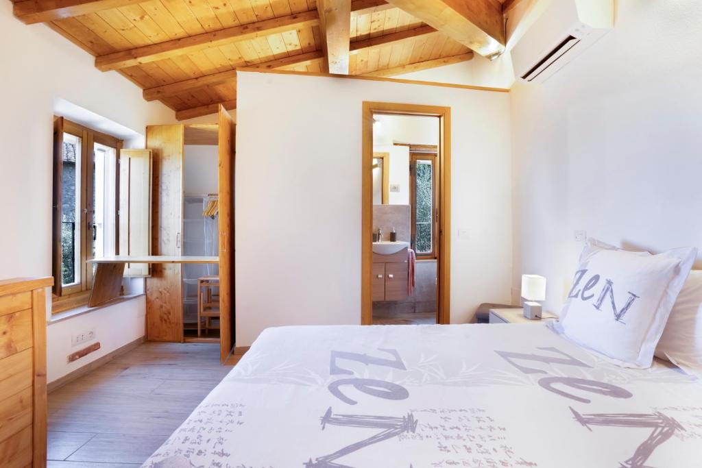 A bed or beds in a room at Tower House with emotional shower