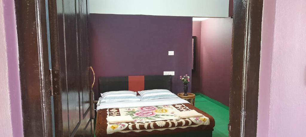 Postel nebo postele na pokoji v ubytování Le Farmhouse Munnar