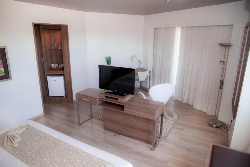 TV a/nebo společenská místnost v ubytování 7 Saltos Resort