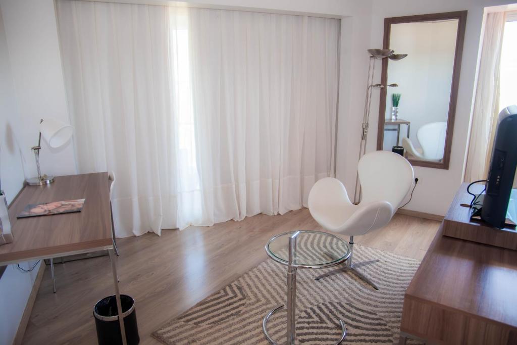 TV a/nebo společenská místnost v ubytování 7 Saltos Resort