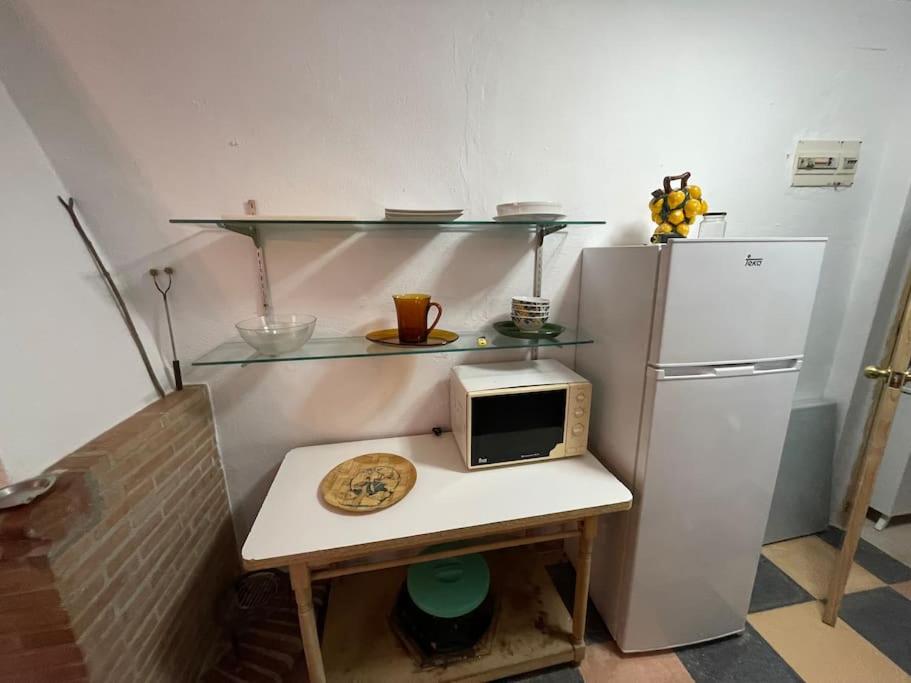 Kuchyňa alebo kuchynka v ubytovaní Villa María, casa rural en Cazalla de la Sierra.