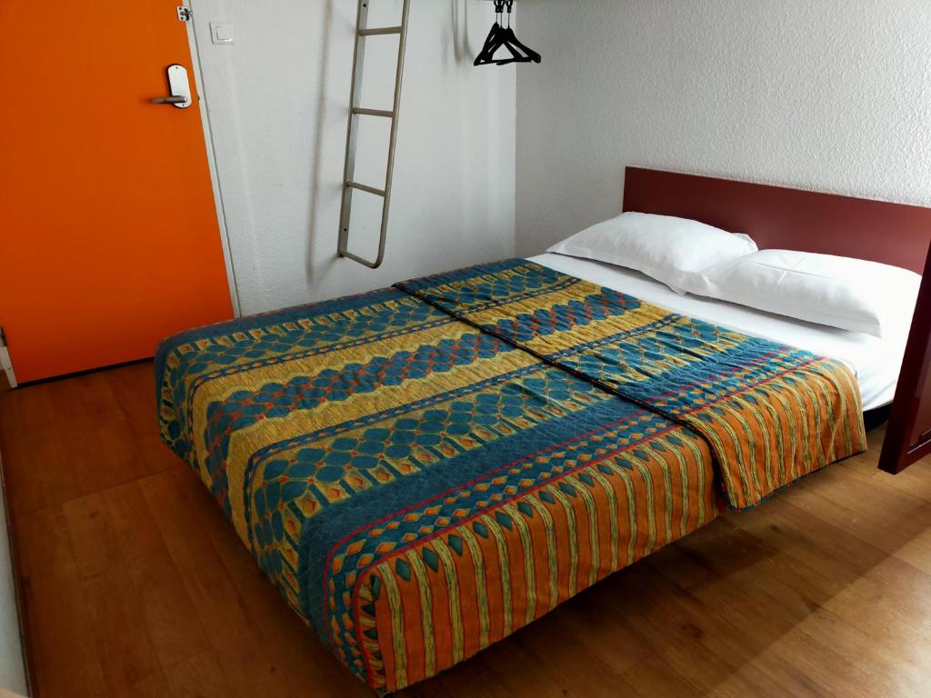 Postel nebo postele na pokoji v ubytování HOTEL THANIA