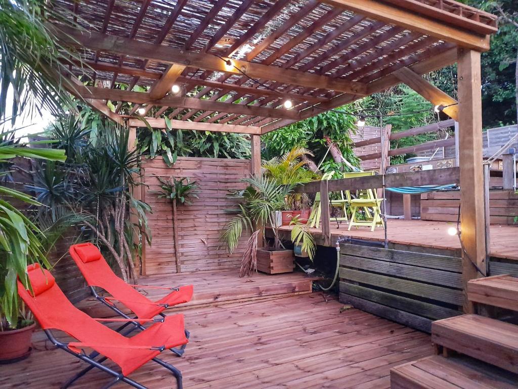 Zahrada ubytování Appartement Papay dans Villa Fleurs des Iles