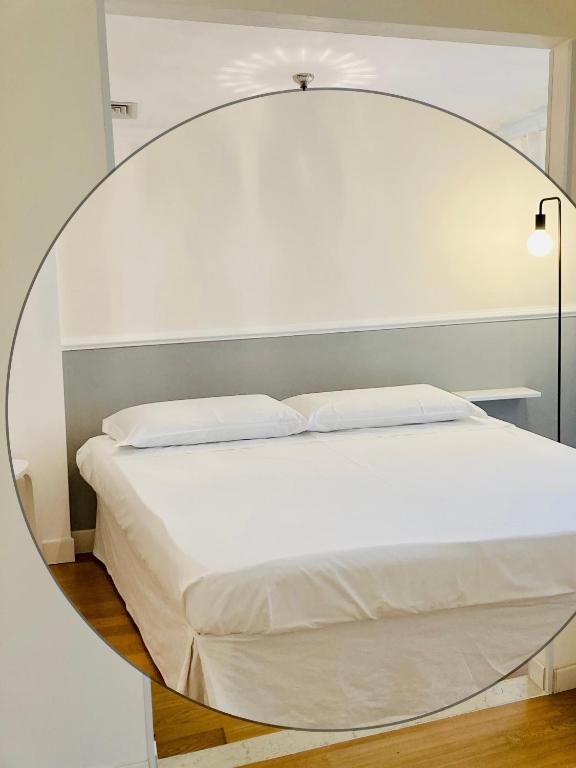 Postel nebo postele na pokoji v ubytování UN PUNTO A VERONA