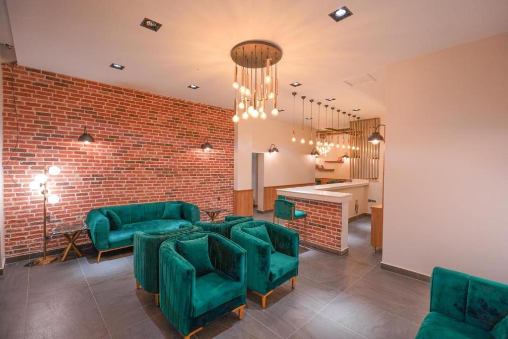 Kuchyň nebo kuchyňský kout v ubytování Hotel Amore