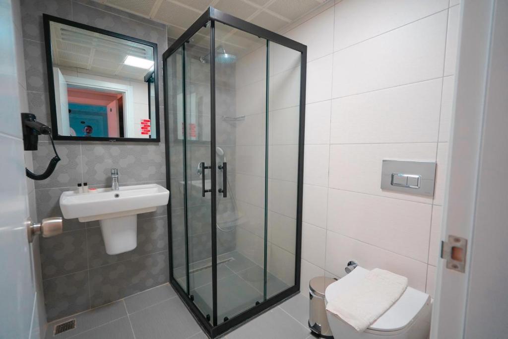 Koupelna v ubytování Hotel Amore