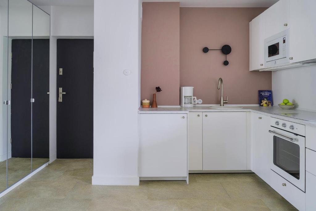 Kuchyňa alebo kuchynka v ubytovaní Warsaw Concierge Waszyngton Lounge