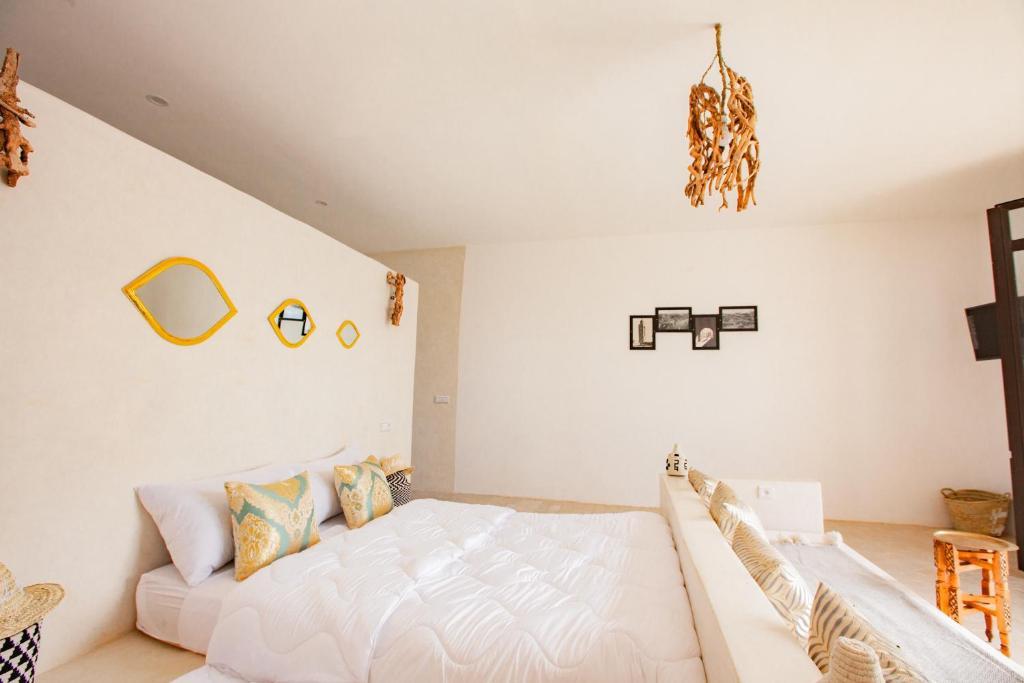 Postel nebo postele na pokoji v ubytování Aghmat Lodge Guest house