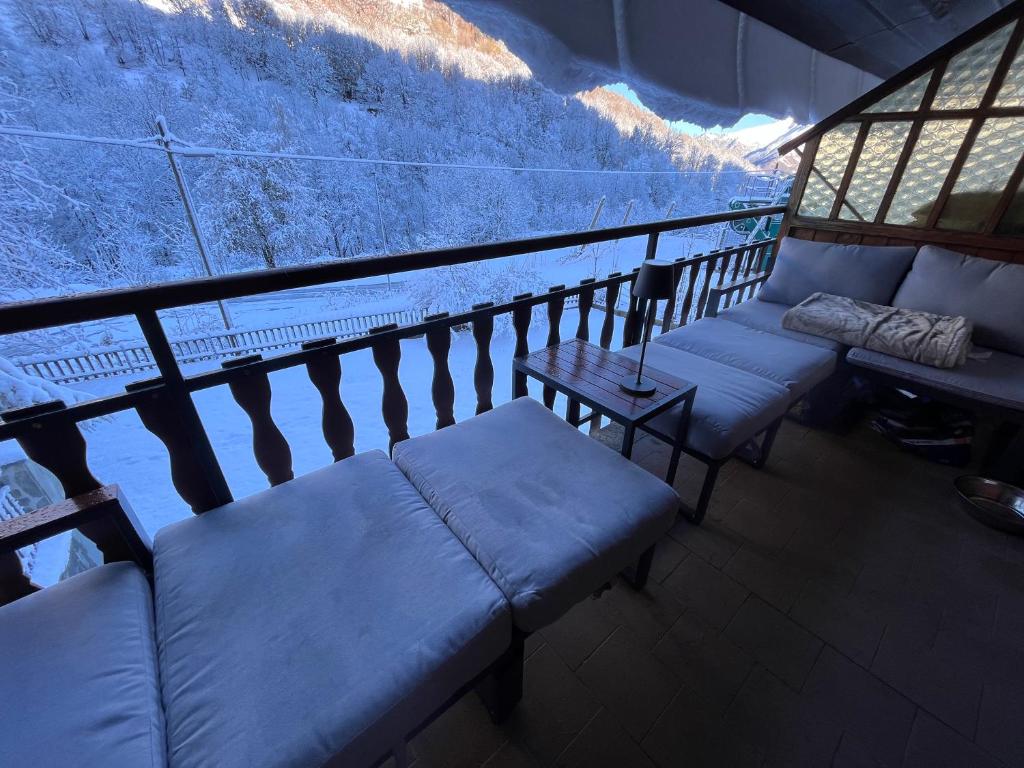 Postel nebo postele na pokoji v ubytování La Baita Limone Riserva Bianca Ski-in Ski-out Seggiovia Morel 1