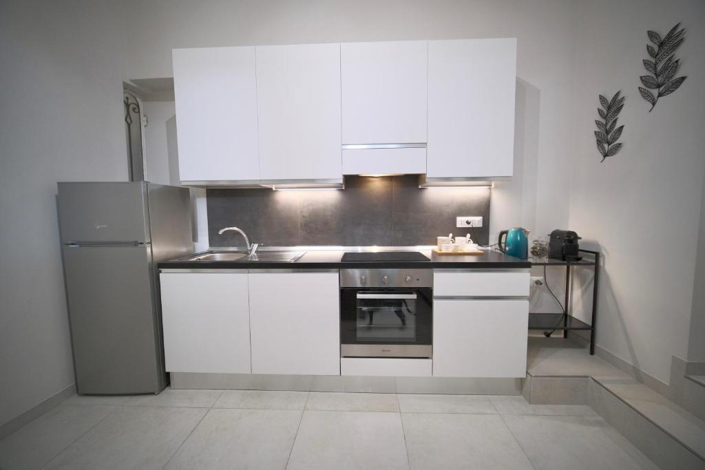 Kuchnia lub aneks kuchenny w obiekcie Appartamento moderno ❴ 300 mt. da PORTA NUOVA ❵