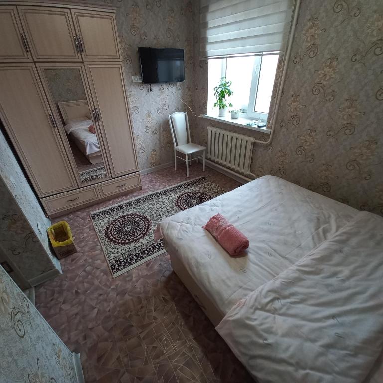 Postel nebo postele na pokoji v ubytování Hotel "Тихий Дом Трансфер"