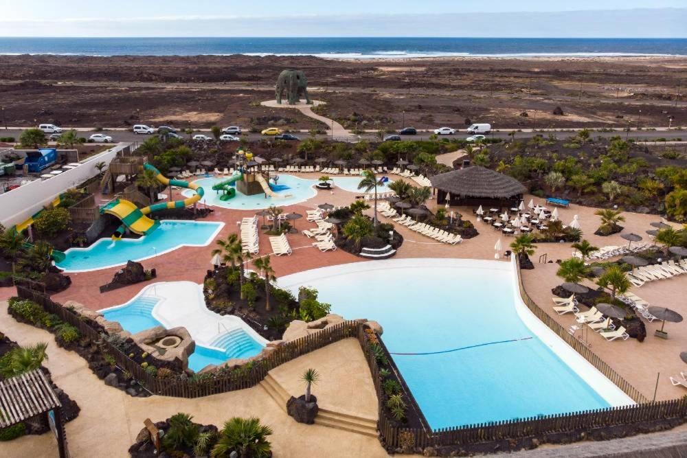an aerial view of a pool at a resort at Casa Encanto in Lajares
