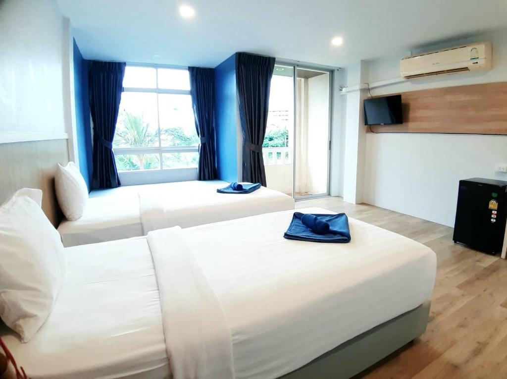 Postel nebo postele na pokoji v ubytování Karon Living Room - SHA Plus