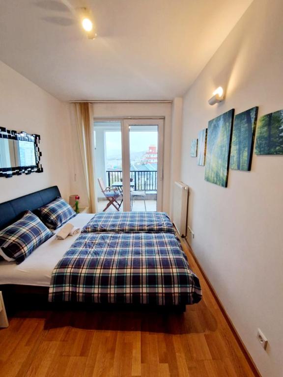 Postel nebo postele na pokoji v ubytování Apartment Lasta