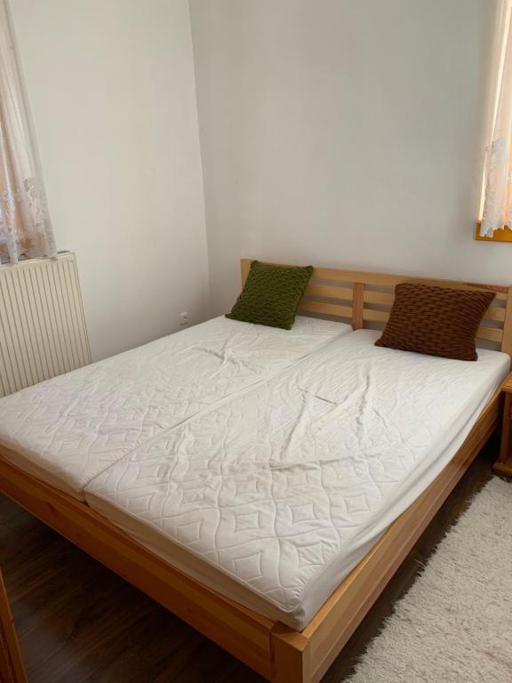 Postel nebo postele na pokoji v ubytování Bolla Nyaralóház