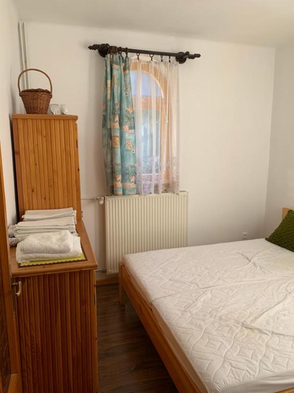 Postel nebo postele na pokoji v ubytování Bolla Nyaralóház