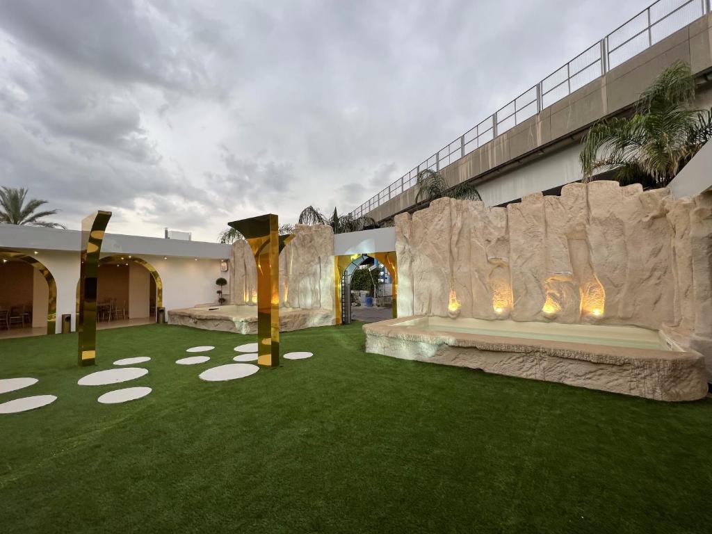 A garden outside Hotel Masaniello Luxury