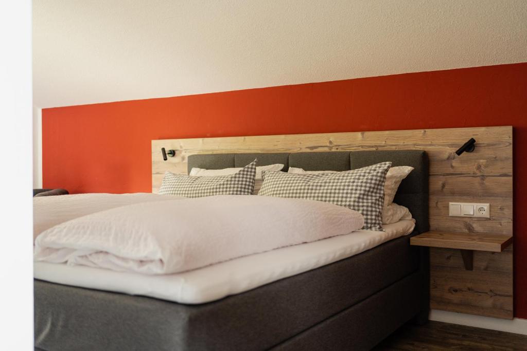 Postel nebo postele na pokoji v ubytování Gästehaus Dauser