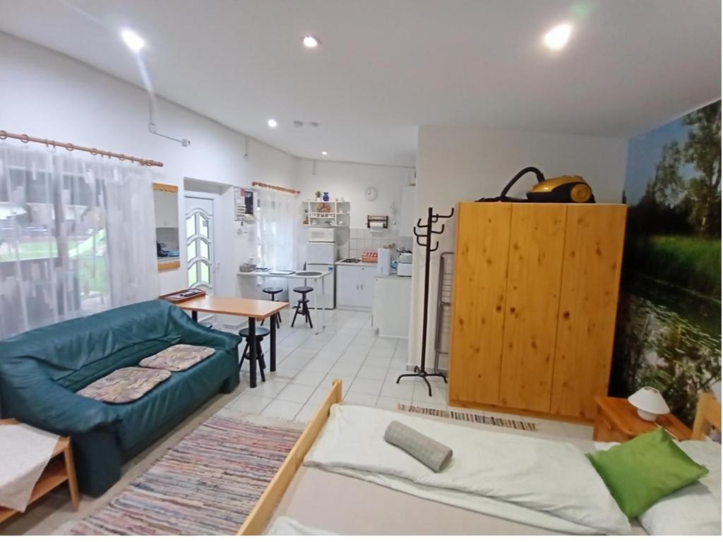 Kuchyň nebo kuchyňský kout v ubytování Harmónia Parasztház és Apartman