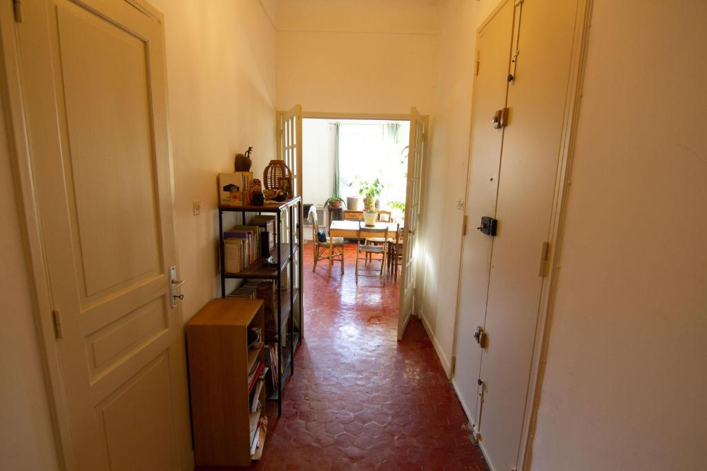 Kuchyňa alebo kuchynka v ubytovaní Jolie chambre dans appartement cosy en plein centre