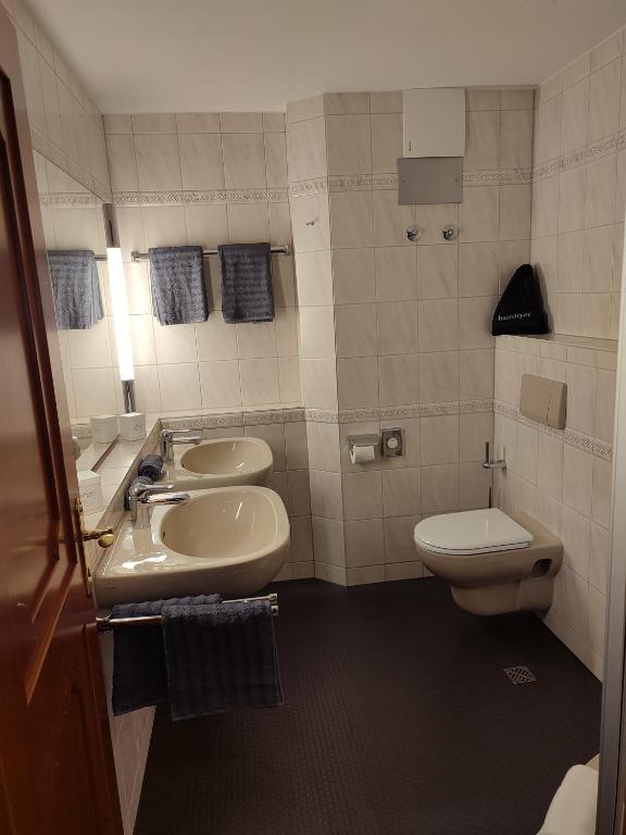 Koupelna v ubytování OSCARS Hotel 1415