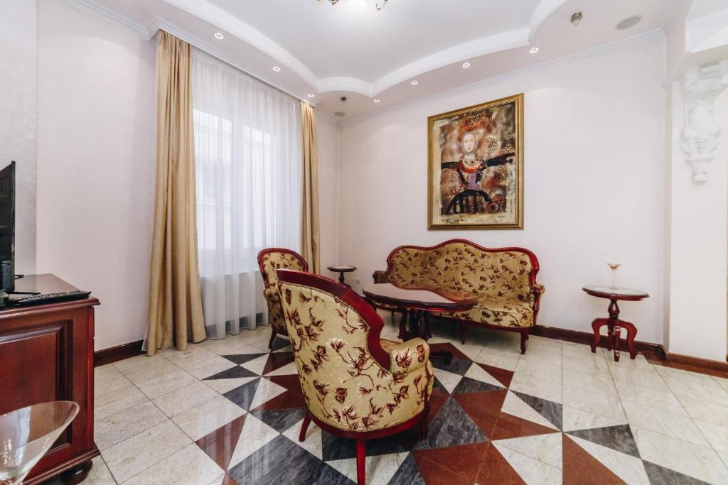 TV a/nebo společenská místnost v ubytování Hotel Madison Kragujevac
