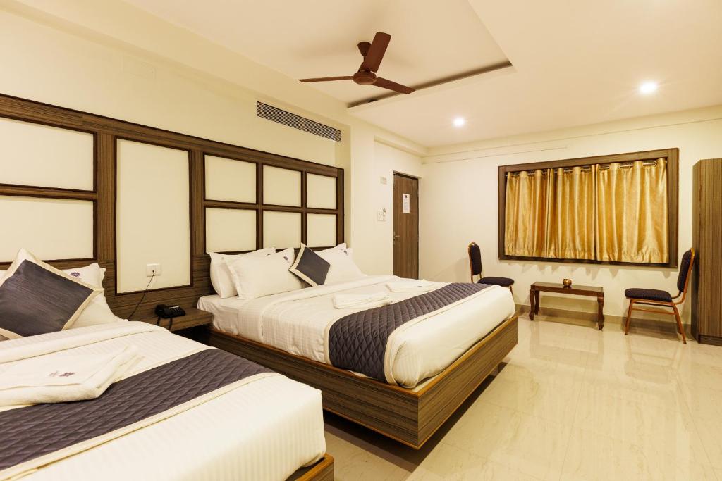 Postel nebo postele na pokoji v ubytování Hotel Comfort Park - Opposite Sri Ramachandra Medical College Porur