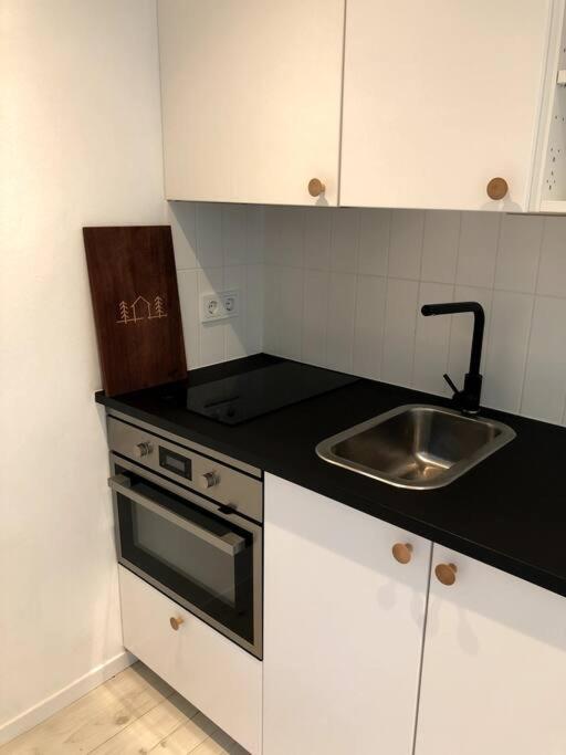 Kuchyň nebo kuchyňský kout v ubytování Forest House, Tiidu