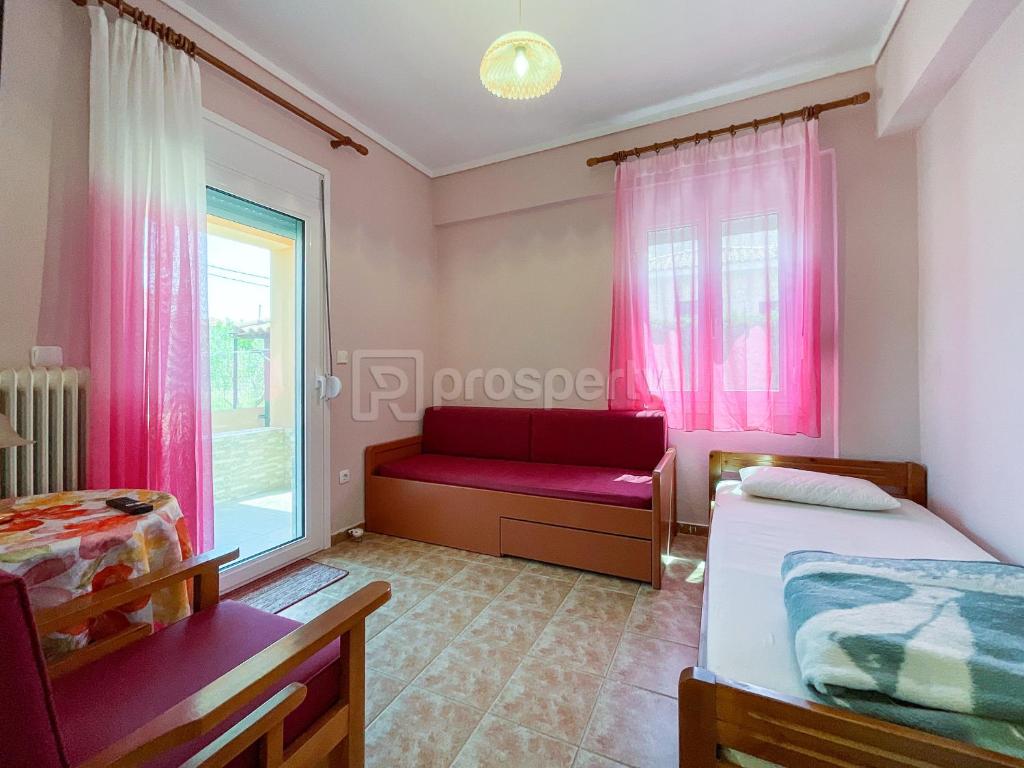 A bed or beds in a room at Private Paradise in Nikiti